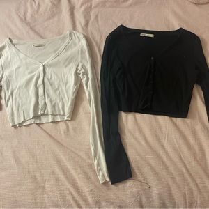 White and black cropped cardigans